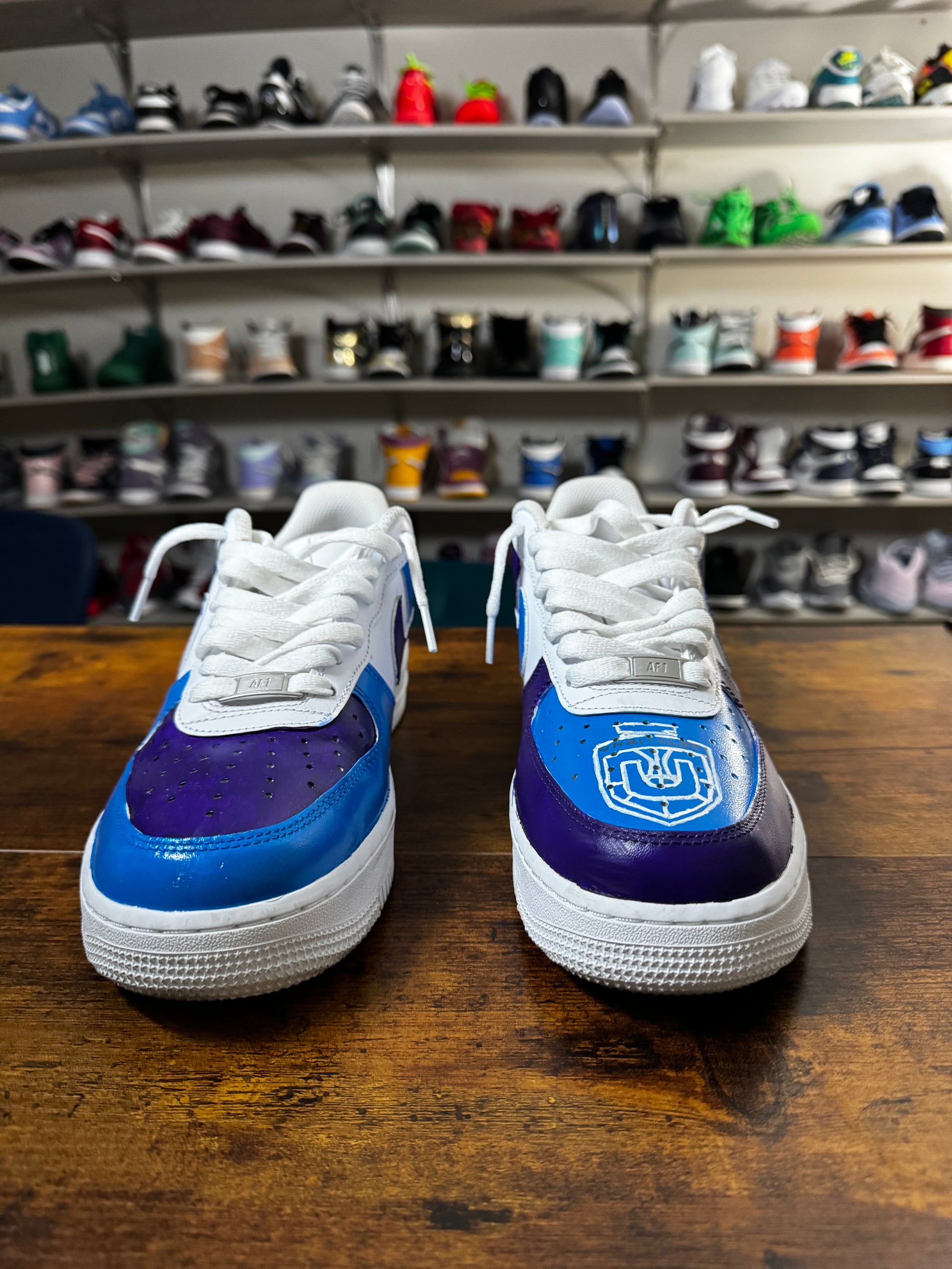 Purple and blue Unrivaled-themed Air Force 1 with logo on toe